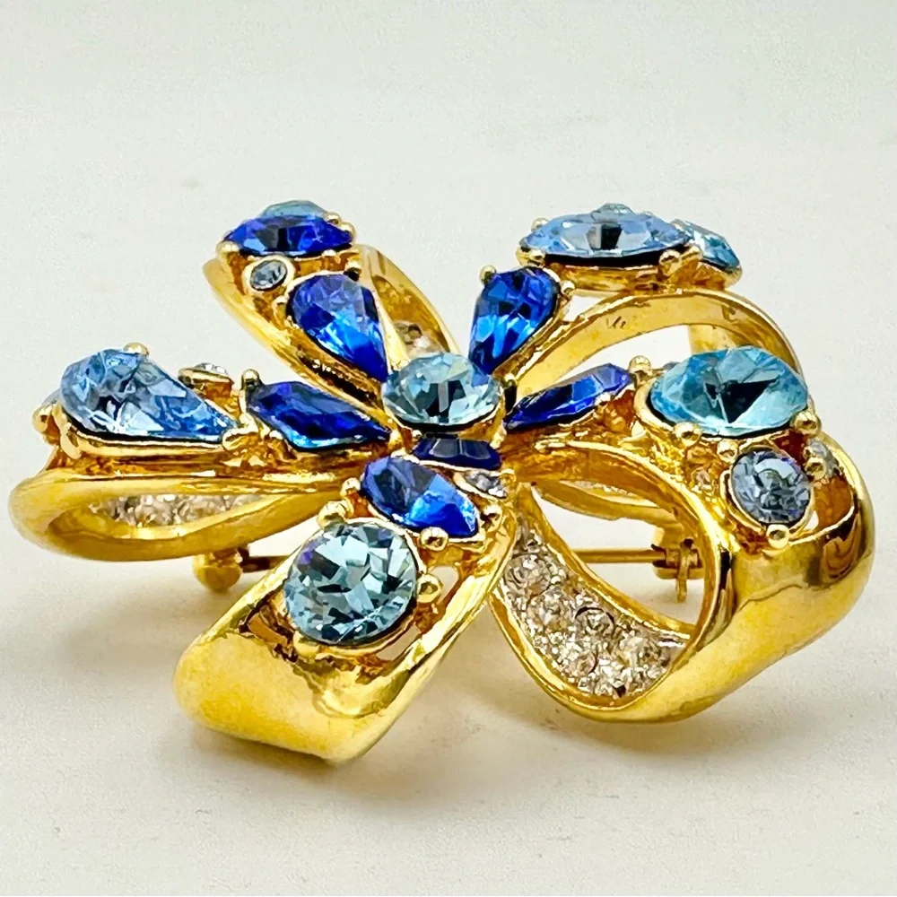 Nolan Miller Blue Tones & Clear Rhinestone Flower Bow Gold Tone Brooch